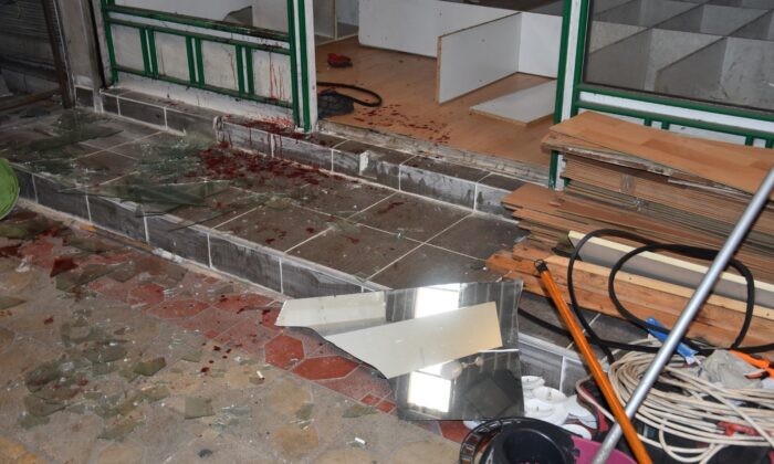 Camı takarken az daha kolu kopuyordu