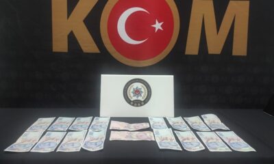 Çocuklara sahte parayla alışveriş saptırdılar