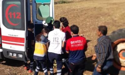 Devrilen traktörün altında kalan sürücüyü itfaiye kurtardı