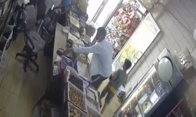 Dondurma yiyerek cep telefonu çalan hırsız, güvenlik kamerasına yakalandı