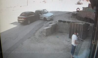 İş yerinin camını temizlerken ezilmekten kıl payı kurtuldu