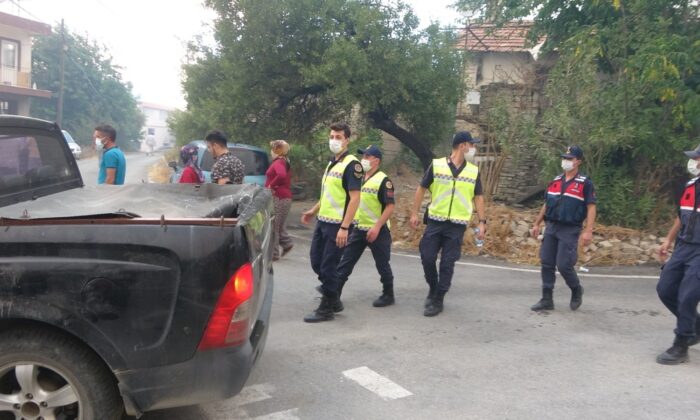 Alevlerin sardığı mahalleye jandarmadan anons: “Lütfen mahalleyi terk edin”