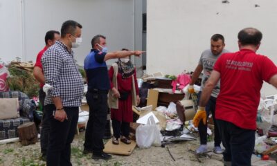 Boş araziyi çöplüğe çeviren kadın mahalleyi kokuya boğdu