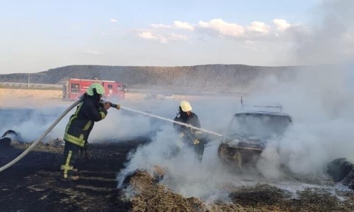 Ekili araziden yükselen alevler arabaya sıçradı